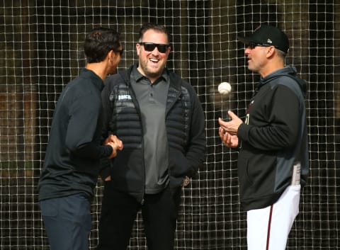 Arizona Diamondbacks GM Mike Hazen, Jared Porter senior VP & assistant GM and manager Torey Lovullo during the first day of spring training workouts on Feb. 13 at Salt River Fields in Scottsdale.Arizona Diamondbacks Spring Training