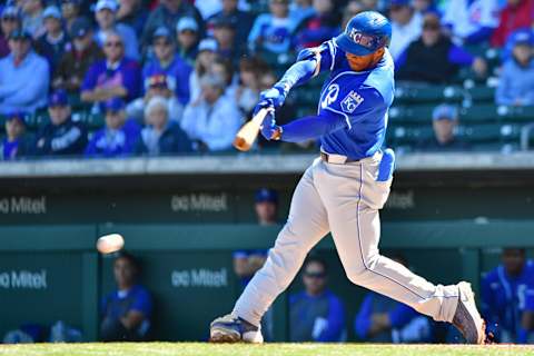 Feb 26, 2020; Mesa, Arizona, USA; Kansas City Royals left fielder Khalil Lee (24) singles in the first inning against the Chicago Cubs at Sloan Park. Mandatory Credit: Matt Kartozian-USA TODAY Sports