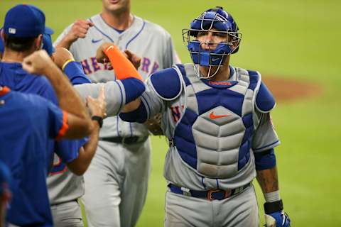 Aug 3, 2020; Atlanta, Georgia, USA; New York Mets catcher Wilson Ramos (40) celebrates with teammates after a victory against the Atlanta Braves at Truist Park. Mandatory Credit: Brett Davis-USA TODAY Sports