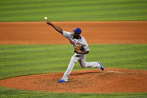 Aug 17, 2020; Miami, Florida, USA; New York Mets relief pitcher Franklyn Kilome (66) delivers a pitch in the eighth inning against the Miami Marlins at Marlins Park. Mandatory Credit: Jasen Vinlove-USA TODAY Sports