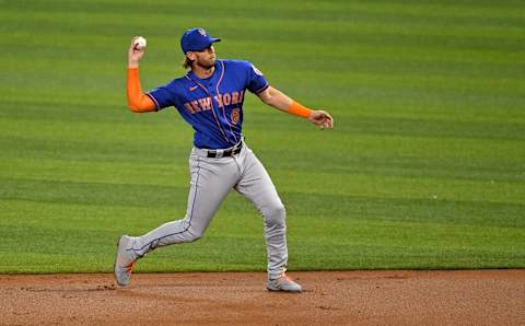 Aug 18, 2020; Miami, Florida, USA; New York Mets second baseman Jeff McNeil (6) throws out a Miami Marlins tase runner in the first inning at Marlins Park. Mandatory Credit: Jasen Vinlove-USA TODAY Sports