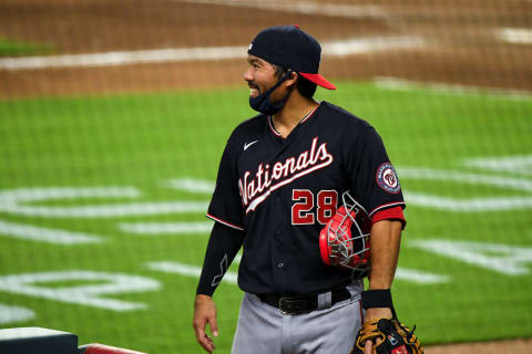 Aug 18, 2020; Cumberland, Georgia, USA; Washington Nationals catcher Kurt Suzuki (28) talks with Atlanta Braves third base coach and former coach Ron Washington (not shown) at Truist Park. Mandatory Credit: Adam Hagy-USA TODAY Sports