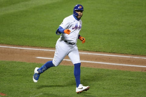 Sep 23, 2020; New York City, New York, USA; New York Mets left fielder Dominic Smith (2) reacts after hitting a solo home run against the Tampa Bay Rays during the fourth inning at Citi Field. Mandatory Credit: Brad Penner-USA TODAY Sports