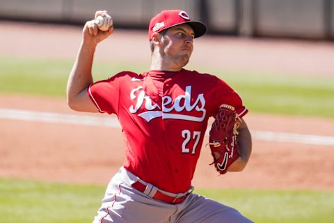 Sep 30, 2020; Cumberland, Georgia, USA; Cincinnati Reds starting pitcher Trevor Bauer (27) pitches against the Atlanta Braves during the fifth inning at Truist Park. Mandatory Credit: Dale Zanine-USA TODAY Sports