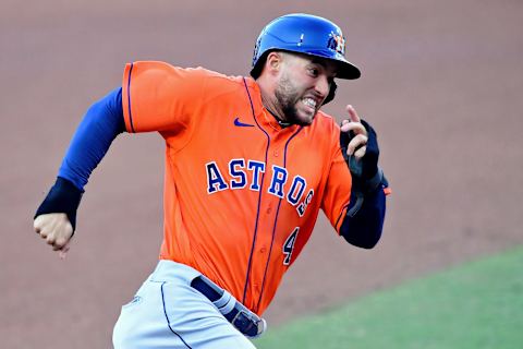 Oct 16, 2020; San Diego, California, USA; Houston Astros center fielder George Springer (4) rounds third base on his way to score against the Tampa Bay Rays on an RBI double hit by second baseman Jose Altuve (not pictured) during the fifth inning during game six of the 2020 ALCS at Petco Park. Mandatory Credit: Jayne Kamin-Oncea-USA TODAY Sports