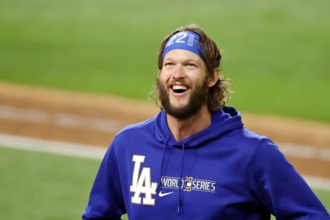 Oct 25, 2020; Arlington, Texas, USA; Los Angeles Dodgers starting pitcher Clayton Kershaw (22) celebrates their win over the Tampa Bay Rays in game five of the 2020 World Series at Globe Life Field. The Los Angeles Dodgers won 4-2. Mandatory Credit: Kevin Jairaj-USA TODAY Sports