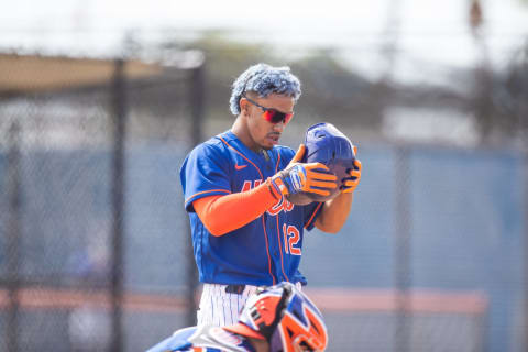 Feb 23, 2021; Port St. Lucie, Florida, USA; New York Mets shortstop Francisco Lindor (12) participates in batting practice during spring training at Clover Park. Mandatory Credit: Mary Holt-USA TODAY Sports