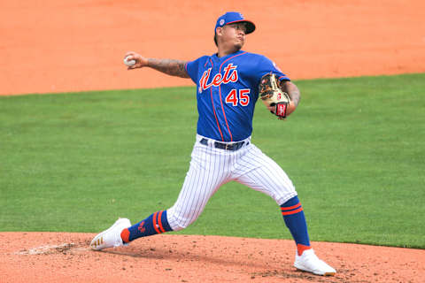 Mar 2, 2021; Port St. Lucie, Florida, USA; New York Mets starting pitcher Jordan Yamamoto (45) delivers a pitch against the Houston Astros during the third inning at Clover Park. Mandatory Credit: Sam Navarro-USA TODAY Sports