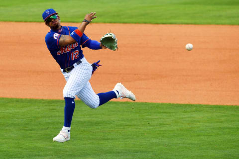 New York Mets infielder Francisco Lindor makes a throw to first base after fielding a ground ball on Tuesday, March 2, 2021, during a spring training game against the Houston Astros at Clover Park in Port St. Lucie. A smaller crowd than usual was in attendance due to COVID-19 restrictions as stadium capacity was reduced by 80 percent.Tcn Mets Opening Day 04