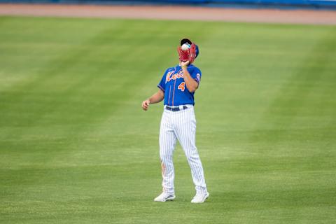 Mar 9, 2021; Port St. Lucie, Florida, USA; New York Mets right fielder Albert Almora Jr. (4) catches a pop fly directly in front of his face during the fifth inning of a spring training game between the St. Louis Cardinals and New York Mets at Clover Park. Mandatory Credit: Mary Holt-USA TODAY Sports