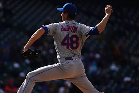 Apr 17, 2021; Denver, Colorado, USA; New York Mets starting pitcher Jacob deGrom (48) delivers a pitch in the fifth inning against the against the Colorado Rockies at Coors Field. Mandatory Credit: Ron Chenoy-USA TODAY Sports