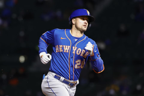 Apr 20, 2021; Chicago, Illinois, USA; New York Mets left fielder J.D. Davis (28) rounds the bases after hitting a solo home run against the Chicago Cubs during the fifth inning at Wrigley Field. Mandatory Credit: Kamil Krzaczynski-USA TODAY Sports