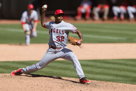 May 30, 2021; Oakland, California, USA; Los Angeles Angels relief pitcher Raisel Iglesias (32) throws a pitch against the Oakland Athletics during the ninth inning at RingCentral Coliseum. Mandatory Credit: John Hefti-USA TODAY Sports