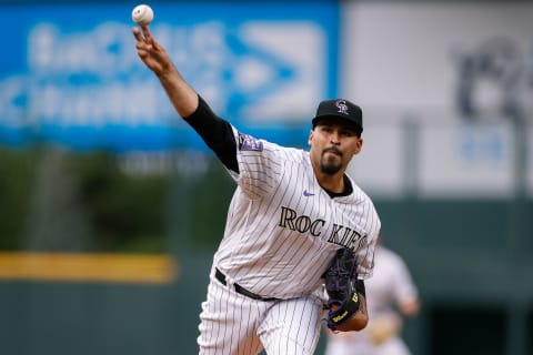 Jun 18, 2021; Denver, Colorado, USA; Colorado Rockies starting pitcher Antonio Senzatela (49) pitches in the first inning against the Milwaukee Brewers at Coors Field. Mandatory Credit: Isaiah J. Downing-USA TODAY Sports