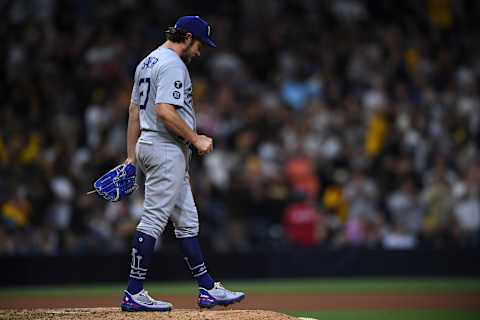 Jun 23, 2021; San Diego, California, USA; Los Angeles Dodgers starting pitcher Trevor Bauer (27) looks on after giving up a home run to San Diego Padres catcher Victor Caratini (not pictured) during the seventh inning at Petco Park. Mandatory Credit: Orlando Ramirez-USA TODAY Sports