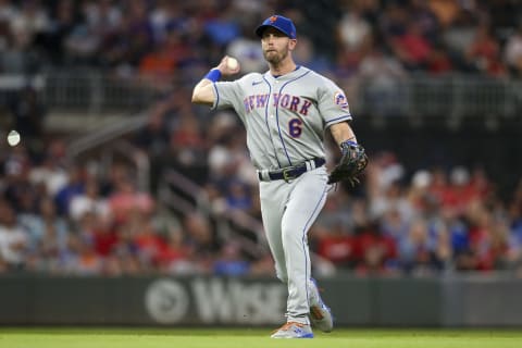 Jun 30, 2021; Atlanta, Georgia, USA; New York Mets third baseman Jeff McNeil (6) throws an Atlanta Braves runner out at first base during the fourth inning at Truist Park. Mandatory Credit: Brett Davis-USA TODAY Sports