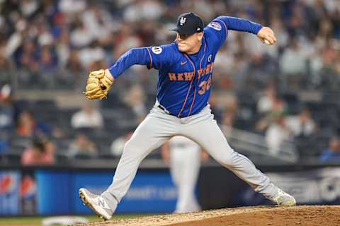 Jul 4, 2021; Bronx, New York, USA; New York Mets relief pitcher Aaron Loup (32) delivers a pitch during the fifth inning against the New York Yankees at Yankee Stadium. Mandatory Credit: Vincent Carchietta-USA TODAY Sports