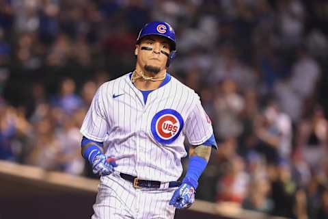 Jul 6, 2021; Chicago, Illinois, USA; Chicago Cubs shortstop Javier Baez (9) reacts after hitting a home run in the sixth inning against the Philadelphia Phillies at Wrigley Field. Mandatory Credit: Quinn Harris-USA TODAY Sports