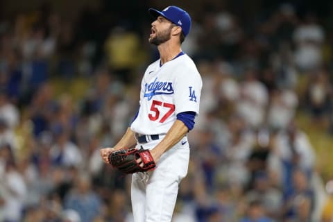 Jul 10, 2021; Los Angeles, California, USA; Los Angeles Dodgers relief pitcher Jake Reed (57) celebrates after defeating the Arizona Diamondback sat Dodger Stadium. Mandatory Credit: Kirby Lee-USA TODAY Sports