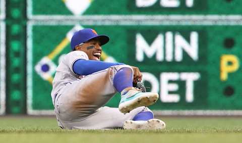 Jul 16, 2021; Pittsburgh, Pennsylvania, USA; New York Mets shortstop Francisco Lindor (12) reacts after catching a line drive for an out on a ball hit by Pittsburgh Pirates second baseman Adam Frazier (not pictured) during the first inning at PNC Park. Mandatory Credit: Charles LeClaire-USA TODAY Sports