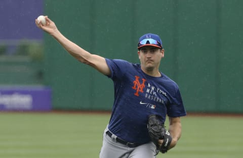 Jul 17, 2021; Pittsburgh, Pennsylvania, USA; New York Mets relief pitcher Seth Lugo (67) throws in the outfield before playing the Pittsburgh Pirates at PNC Park. Mandatory Credit: Charles LeClaire-USA TODAY Sports