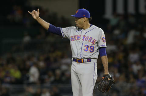 Jul 17, 2021; Pittsburgh, Pennsylvania, USA; New York Mets relief pitcher Edwin Diaz (39) gestures to the outfield against the Pittsburgh Pirates during the ninth inning at PNC Park. Pittsburgh won 9-7. Mandatory Credit: Charles LeClaire-USA TODAY Sports