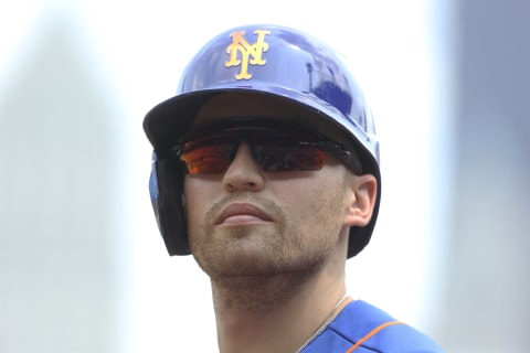 Jul 18, 2021; Pittsburgh, Pennsylvania, USA; New York Mets center fielder Brandon Nimmo (9) looks on from the on-deck circle against the Pittsburgh Pirates during the fourth inning at PNC Park. Mandatory Credit: Charles LeClaire-USA TODAY Sports