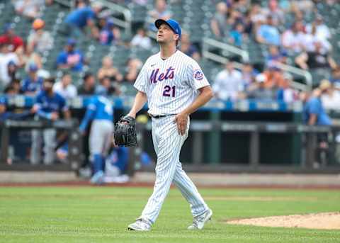 Jul 25, 2021; New York City, New York, USA; New York Mets pitcher Rich Hill (14) walks back to the dugout after being taken out of the game in the sixth inning against the Toronto Blue Jays at Citi Field. Mandatory Credit: Wendell Cruz-USA TODAY Sports