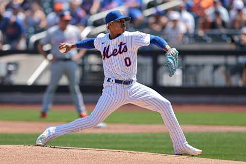 Aug 12, 2021; New York City, NY, USA; New York Mets starting pitcher Marcus Stroman (0) delivers a pitch during the first inning against the Washington Nationals at Citi Field. Mandatory Credit: Vincent Carchietta-USA TODAY Sports