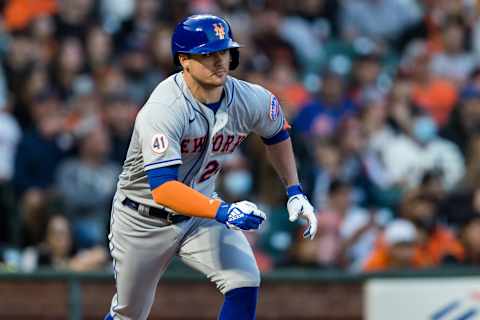 Aug 16, 2021; San Francisco, California, USA; New York Mets third baseman J.D. Davis (28) watches his single against the San Francisco Giants in the fourth inning at Oracle Park. Mandatory Credit: John Hefti-USA TODAY Sports