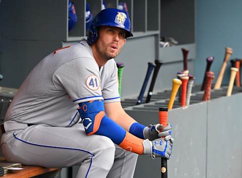 Aug 21, 2021; Los Angeles, California, USA; New York Mets third baseman Jeff McNeil (6) sits in the dugout as he waits for his first at bat of the game against the Los Angeles Dodgers at Dodger Stadium. Mandatory Credit: Jayne Kamin-Oncea-USA TODAY Sports