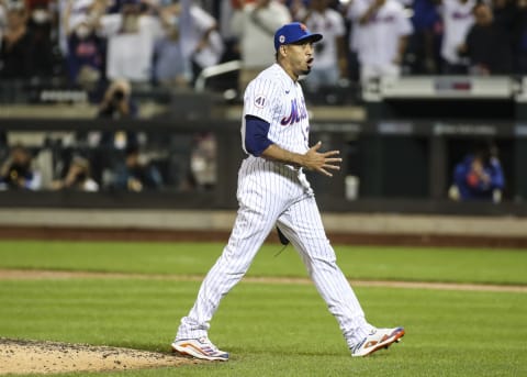 Aug 28, 2021; New York City, New York, USA; New York Mets pitcher Edwin Diaz (39) reacts after recording a save in a 5-3 victory over the Washington Nationals at Citi Field. Mandatory Credit: Wendell Cruz-USA TODAY Sports