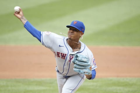 Sep 4, 2021; Washington, District of Columbia, USA; New York Mets starting pitcher Marcus Stroman (0) throws the ball in the first inning against the Washington Nationals at Nationals Park. Mandatory Credit: Amber Searls-USA TODAY Sports