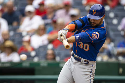 Sep 5, 2021; Washington, District of Columbia, USA; New York Mets right fielder Michael Conforto (30) hits a two RBI single against the Washington Nationals during the first inning at Nationals Park. Mandatory Credit: Scott Taetsch-USA TODAY Sports