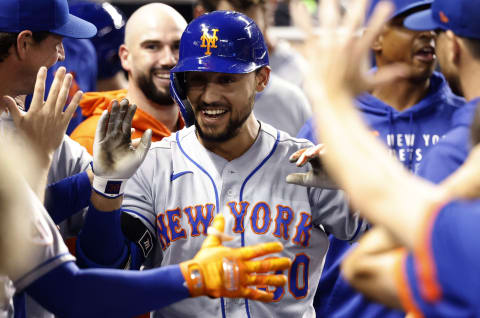 Sep 8, 2021; Miami, Florida, USA; New York Mets right fielder Michael Conforto (30) celebrates his solo home run with teammates against the Miami Marlins during the seventh inning at loanDepot Park Mandatory Credit: Rhona Wise-USA TODAY Sports