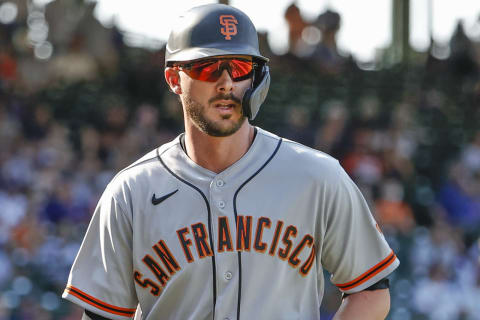 Sep 10, 2021; Chicago, Illinois, USA; San Francisco Giants third baseman Kris Bryant (23) reacts after scoring against the Chicago Cubs during the eight inning at Wrigley Field. Mandatory Credit: Kamil Krzaczynski-USA TODAY Sports