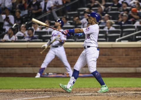 Sep 12, 2021; New York City, New York, USA; New York Mets shortstop Francisco Lindor (12) hits his third home run of the game in the eighth inning against the New York Yankees at Citi Field. Mandatory Credit: Wendell Cruz-USA TODAY Sports