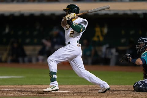 Sep 20, 2021; Oakland, California, USA; Oakland Athletics center fielder Starling Marte (2) hits a single against the Seattle Mariners during the eighth inning at RingCentral Coliseum. Mandatory Credit: Stan Szeto-USA TODAY Sports