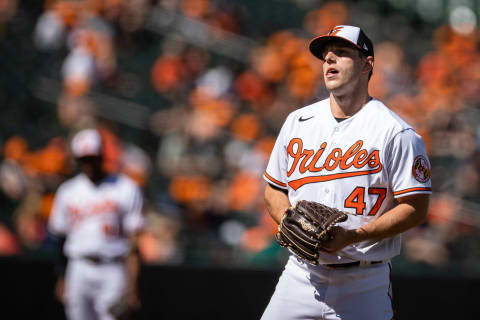 Sep 26, 2021; Baltimore, Maryland, USA; Baltimore Orioles starting pitcher John Means (47) reacts after giving up a two run home run against the Texas Rangers during the fourth inning at Oriole Park at Camden Yards. Mandatory Credit: Scott Taetsch-USA TODAY Sports