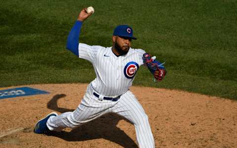 Aug 23, 2020; Chicago, Illinois, USA; Chicago Cubs relief pitcher Jeremy Jeffress (24) pitches against the Chicago White Sox during the ninth inning at Wrigley Field. Mandatory Credit: David Banks-USA TODAY Sports