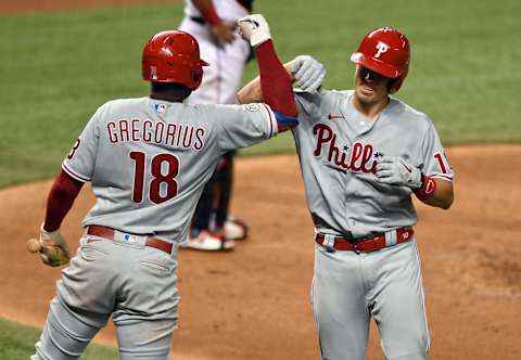 Sep 10, 2020; Miami, Florida, USA; Philadelphia Phillies catcher J.T. Realmuto (10) is congratulated after hitting a solo home run in the fifth inning against the Miami Marlins by shortstop Didi Gregorius (not pictured) at Marlins Park. Mandatory Credit: Jim Rassol-USA TODAY Sports