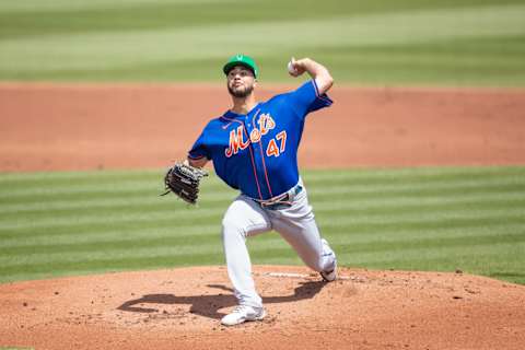 Mar 17, 2021; Jupiter, Florida, USA; New York Mets starting pitcher Joey Lucchesi (47) delivers a pitch during a spring training game between the Miami Marlins and the New York Mets at Roger Dean Chevrolet Stadium. Mandatory Credit: Mary Holt-USA TODAY Sports