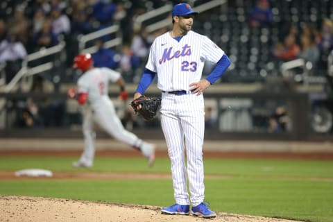 Apr 14, 2021; New York City, New York, USA; New York Mets starting pitcher David Peterson (23) reacts after allowing a solo home run to Philadelphia Phillies second baseman Jean Segura (2) during the fifth inning at Citi Field. Mandatory Credit: Brad Penner-USA TODAY Sports