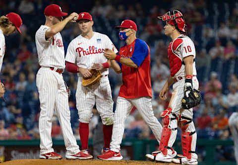 Jun 4, 2021; Philadelphia, Pennsylvania, USA; Philadelphia Phillies manager Joe Girardi relieves starting pitcher Zack Wheeler (45) during the eighth inning against the Washington Nationals at Citizens Bank Park. Mandatory Credit: Bill Streicher-USA TODAY Sports