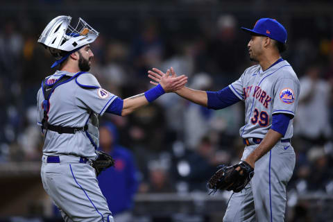 Jun 5, 2021; San Diego, California, USA; New York Mets catcher Tomas Nido (left) and relief pitcher Edwin Diaz (39) celebrate on the field after defeating the San Diego Padres at Petco Park. Mandatory Credit: Orlando Ramirez-USA TODAY Sports