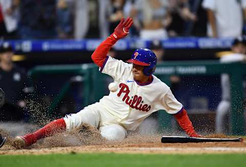 Jun 12, 2021; Philadelphia, Pennsylvania, USA; Philadelphia Phillies shortstop Ronald Torreyes (74) slides home to score a run on a walk-off single by second baseman Jean Segura (not pictured) during the tenth inning against the New York Yankees at Citizens Bank Park. Mandatory Credit: Kyle Ross-USA TODAY Sports