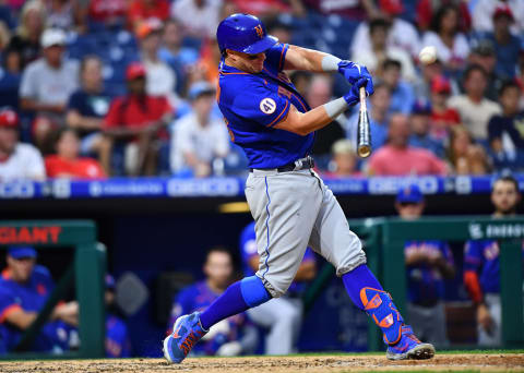 Aug 7, 2021; Philadelphia, Pennsylvania, USA; New York Mets catcher James McCann (33) hits a solo home run in the ninth inning against the Philadelphia Phillies at Citizens Bank Park. Mandatory Credit: Kyle Ross-USA TODAY Sports