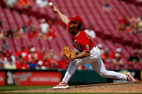 Cincinnati Reds relief pitcher Michael Lorenzen (21) throws a pitch in the ninth inning of the MLB National League game between the Cincinnati Reds and the Miami Marlins at Great American Ball Park in downtown Cincinnati on Sunday, Aug. 22, 2021. The Reds took the lead and won, 3-1, on two solo home runs from Mike Moustakas and Tyler Naquin.Miami Marlins At Cincinnati Reds