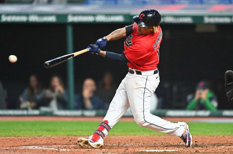 Sep 24, 2021; Cleveland, Ohio, USA; Cleveland Indians third baseman Jose Ramirez (11) hits an RBI single during the sixth inning against the Chicago White Sox at Progressive Field. Mandatory Credit: Ken Blaze-USA TODAY Sports