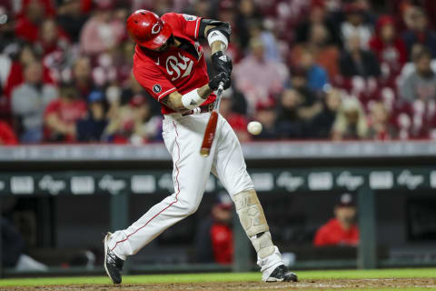 Sep 25, 2021; Cincinnati, Ohio, USA; Cincinnati Reds right fielder Nick Castellanos (2) hits a solo home run to win the game against the Washington Nationals in the ninth inning at Great American Ball Park. Mandatory Credit: Katie Stratman-USA TODAY Sports